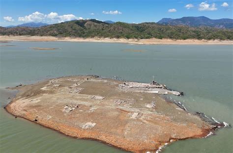 Submerged town emerges as water reservoir levels drop .